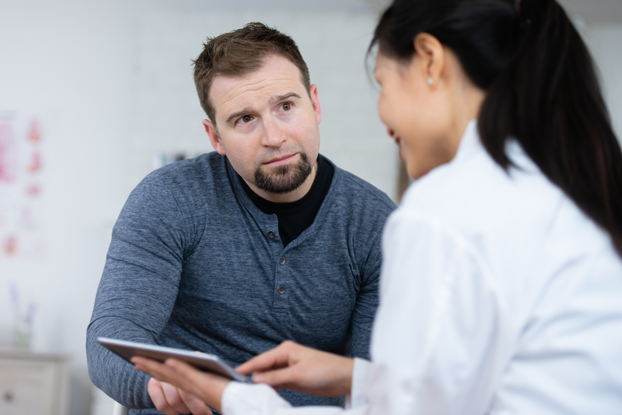 Hemwell Doctor Talking to Patient about hemorrhoids